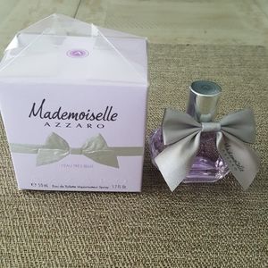 Sephora Lavender Mademoiselle Azzaro Perfume Bottle with Silver Bow. 3/4 full.